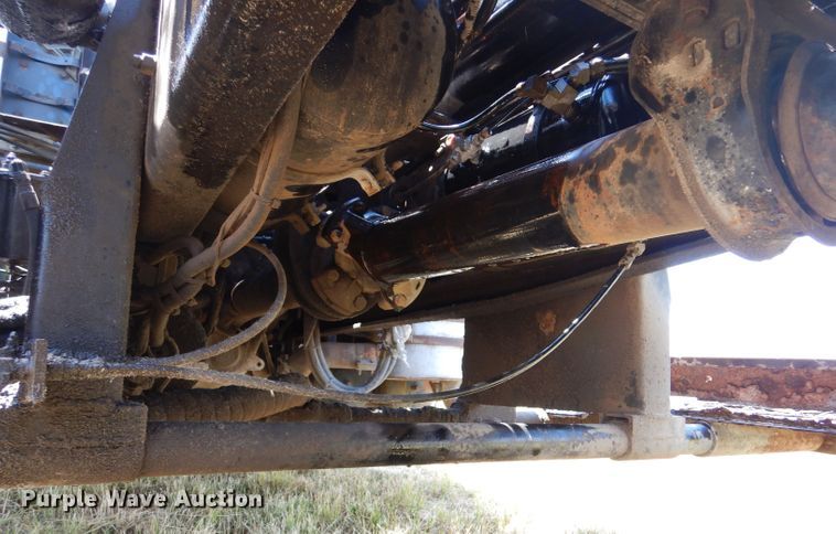 image for item LP9373 1999 Mack 600 DM Maxidyne  roll-off container truck