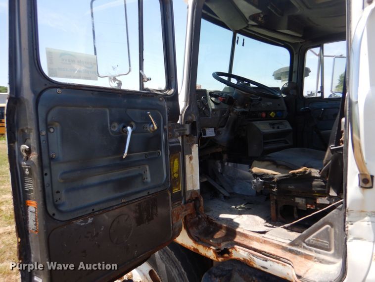 image for item LP9373 1999 Mack 600 DM Maxidyne  roll-off container truck