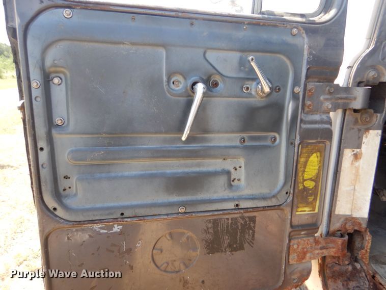 image for item LP9373 1999 Mack 600 DM Maxidyne  roll-off container truck