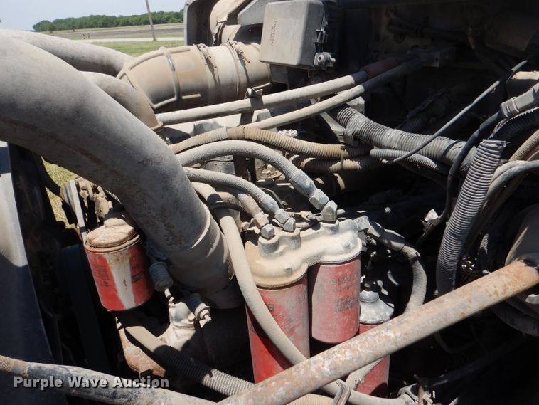 image for item LP9373 1999 Mack 600 DM Maxidyne  roll-off container truck