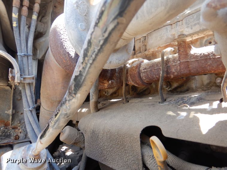 image for item LP9373 1999 Mack 600 DM Maxidyne  roll-off container truck