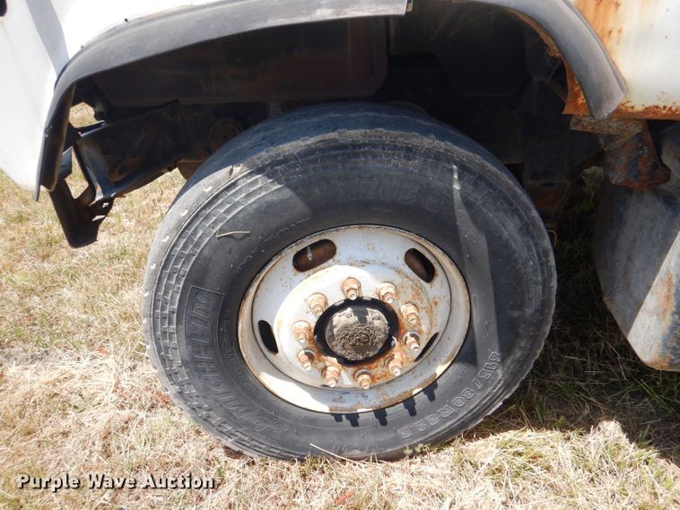 image for item LP9373 1999 Mack 600 DM Maxidyne  roll-off container truck