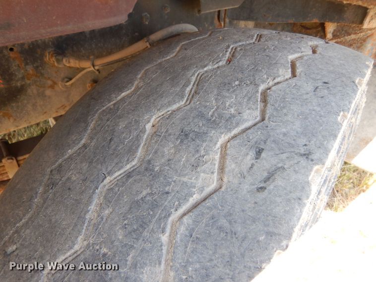 image for item LP9373 1999 Mack 600 DM Maxidyne  roll-off container truck