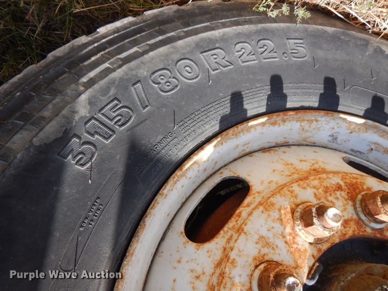 image for item LP9373 1999 Mack 600 DM Maxidyne  roll-off container truck