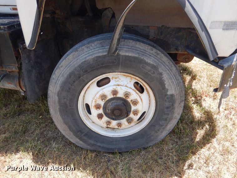 image for item LP9373 1999 Mack 600 DM Maxidyne  roll-off container truck