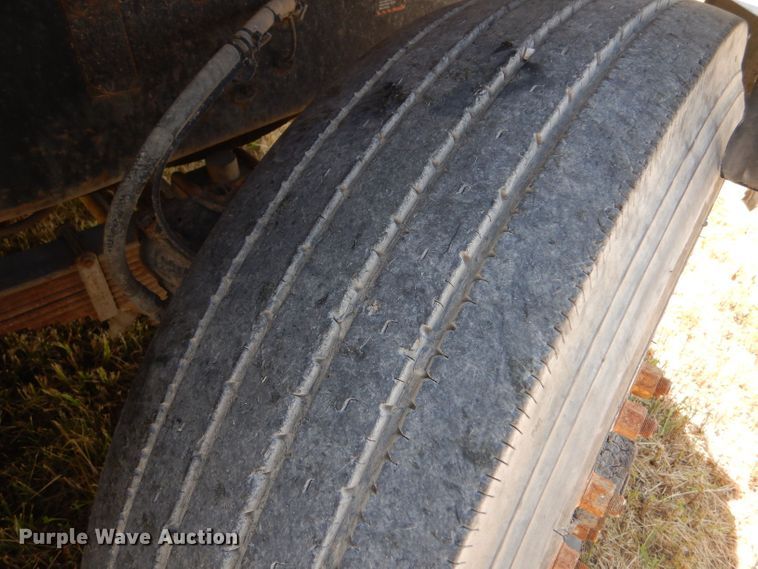 image for item LP9373 1999 Mack 600 DM Maxidyne  roll-off container truck