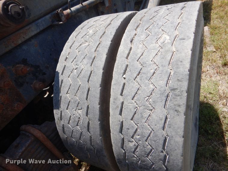 image for item LP9373 1999 Mack 600 DM Maxidyne  roll-off container truck