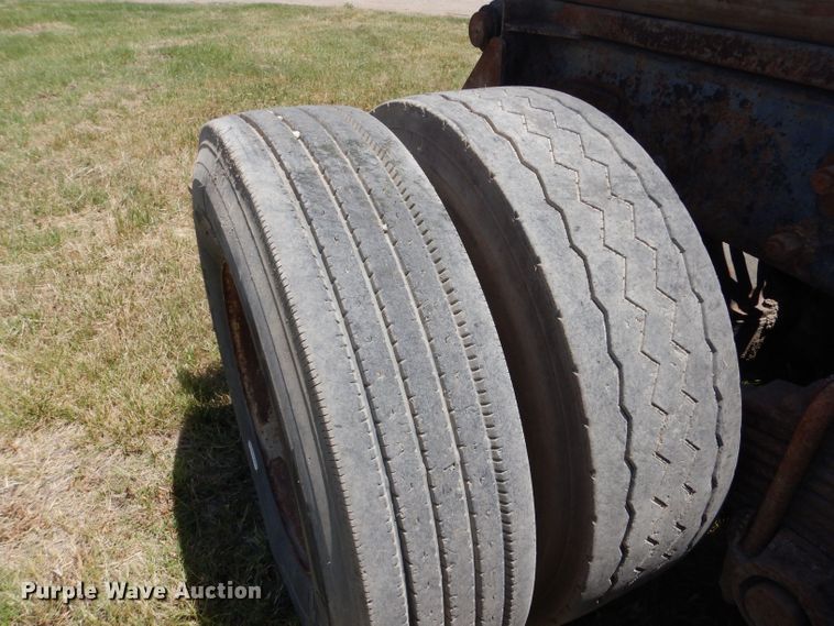 image for item LP9373 1999 Mack 600 DM Maxidyne  roll-off container truck