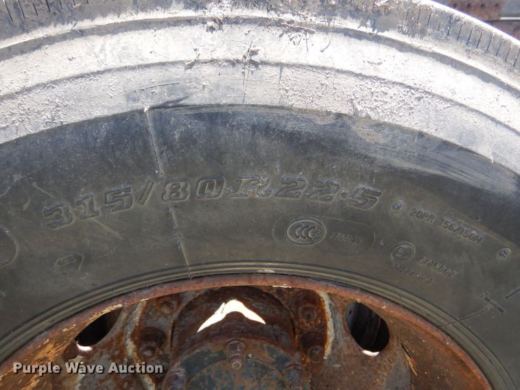 image for item LP9373 1999 Mack 600 DM Maxidyne  roll-off container truck