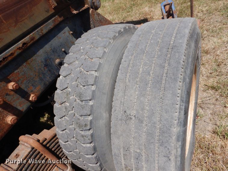 image for item LP9373 1999 Mack 600 DM Maxidyne  roll-off container truck