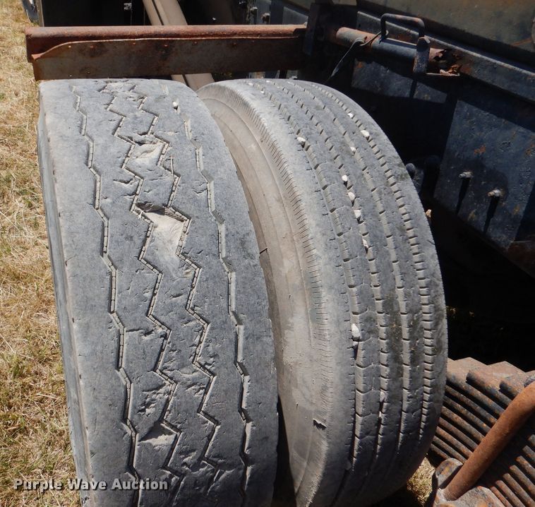 image for item LP9373 1999 Mack 600 DM Maxidyne  roll-off container truck