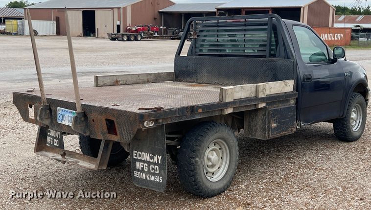 image for item JX9455 2000 Ford F150  bale bed pickup truck