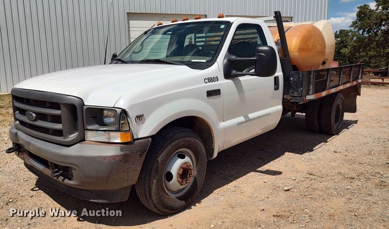 image for item LK9160 2002 Ford F350 Super Duty XL  flatbed pickup truck