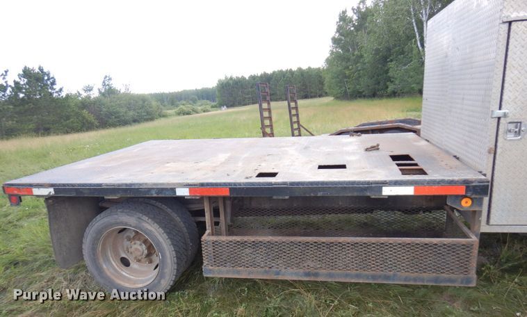 image for item MF9762 1997 Freightliner FL50  flatbed truck