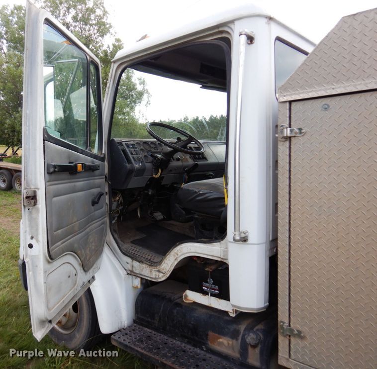 image for item MF9762 1997 Freightliner FL50  flatbed truck