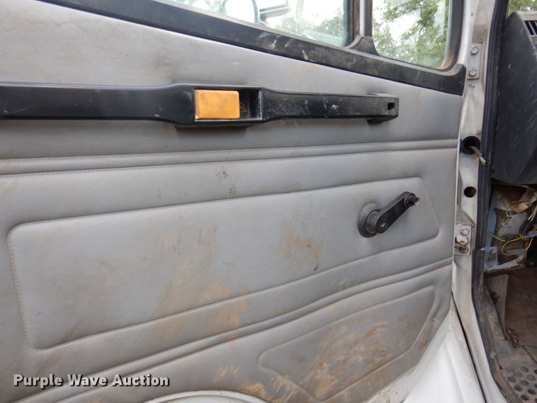 image for item MF9762 1997 Freightliner FL50  flatbed truck