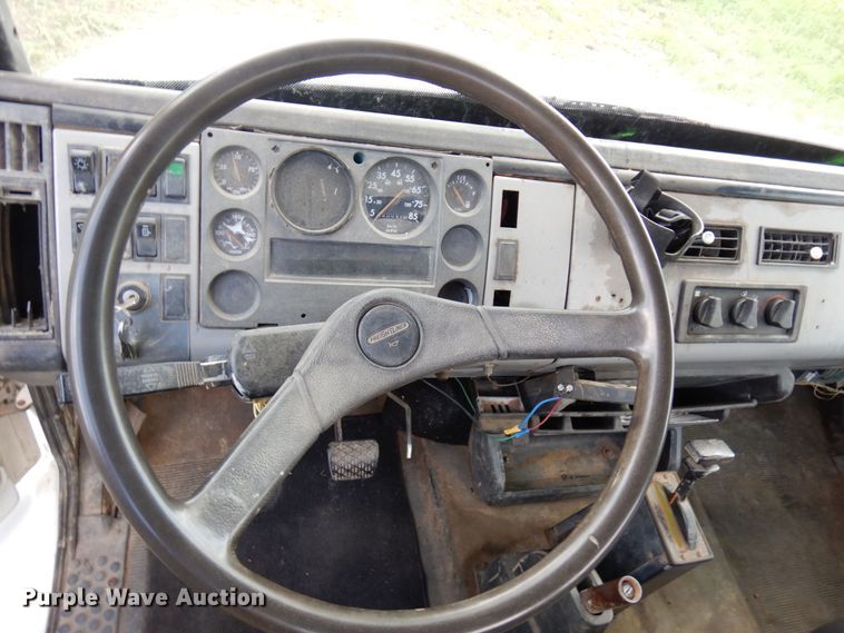 image for item MF9762 1997 Freightliner FL50  flatbed truck