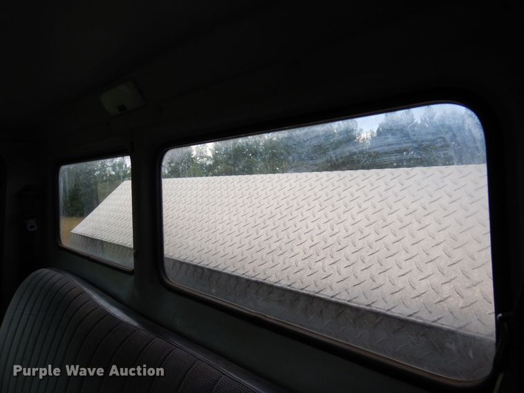 image for item MF9762 1997 Freightliner FL50  flatbed truck