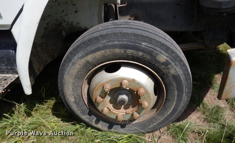 image for item MF9762 1997 Freightliner FL50  flatbed truck