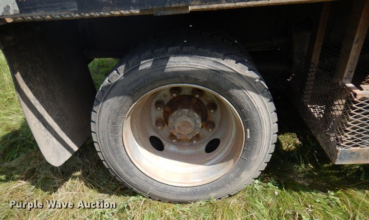 image for item MF9762 1997 Freightliner FL50  flatbed truck