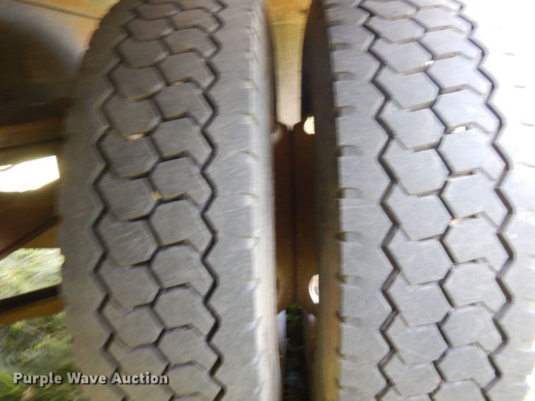 image for item MF9762 1997 Freightliner FL50  flatbed truck