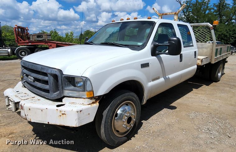 image for item MK9136 2003 Ford F550 XL Super Duty  Crew Cab flatbed truck