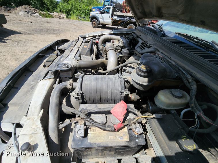 image for item MK9136 2003 Ford F550 XL Super Duty  Crew Cab flatbed truck