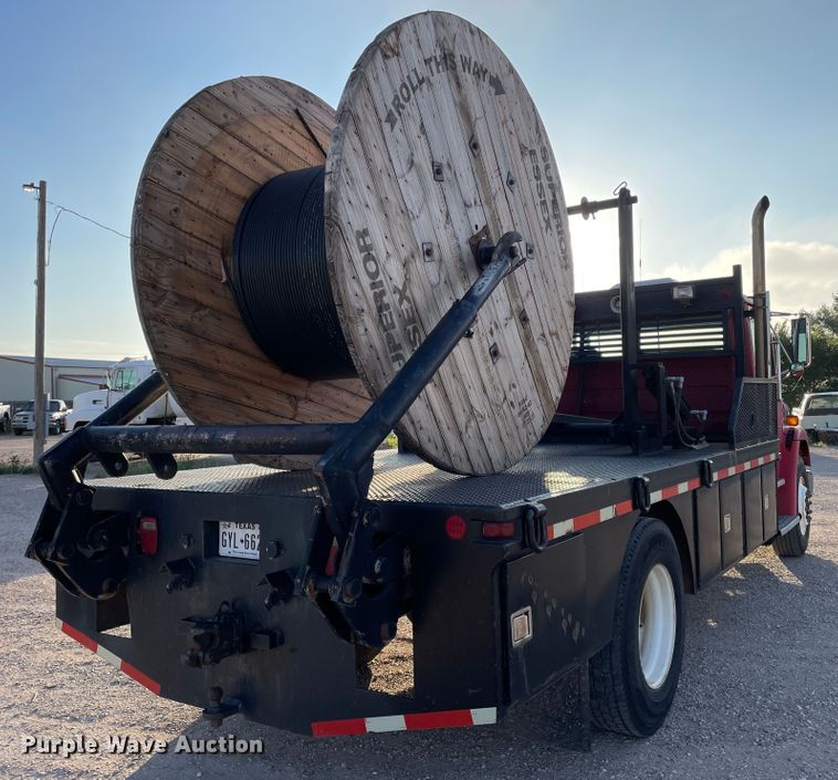 image for item DN5138 1995 Freightliner FL70  Figure 8 fiber optic reel truck