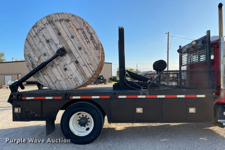 image for item DN5138 1995 Freightliner FL70  Figure 8 fiber optic reel truck