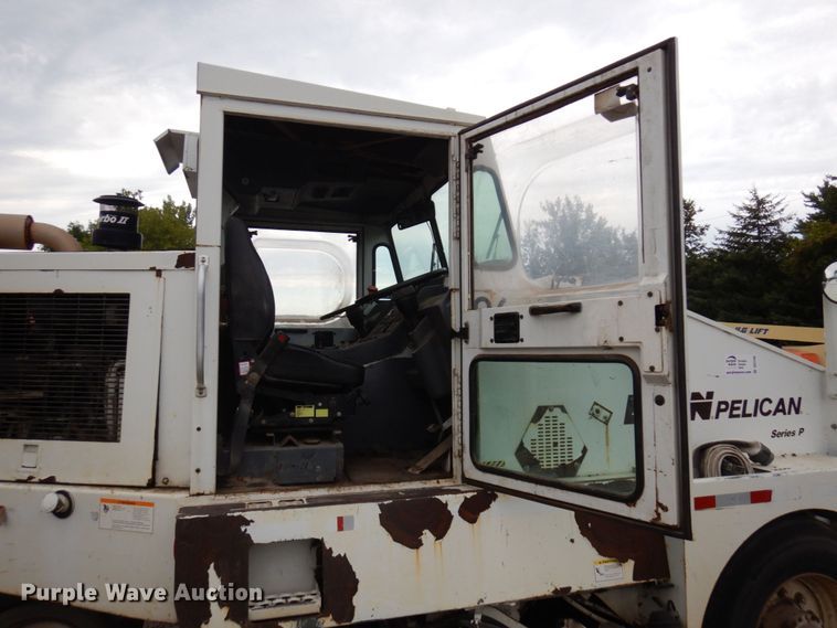 image for item DQ7240 1999 Elgin Pellican Series P  street sweeper truck