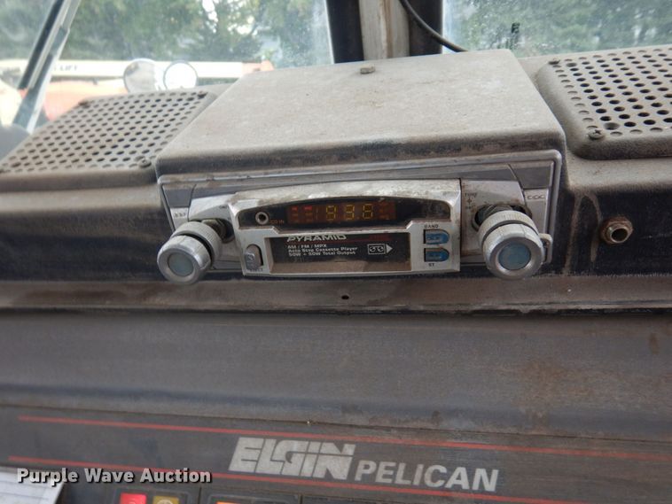 image for item DQ7240 1999 Elgin Pellican Series P  street sweeper truck