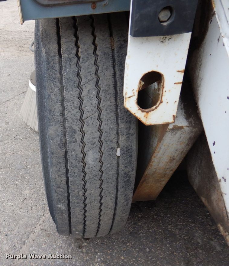 image for item DQ7240 1999 Elgin Pellican Series P  street sweeper truck