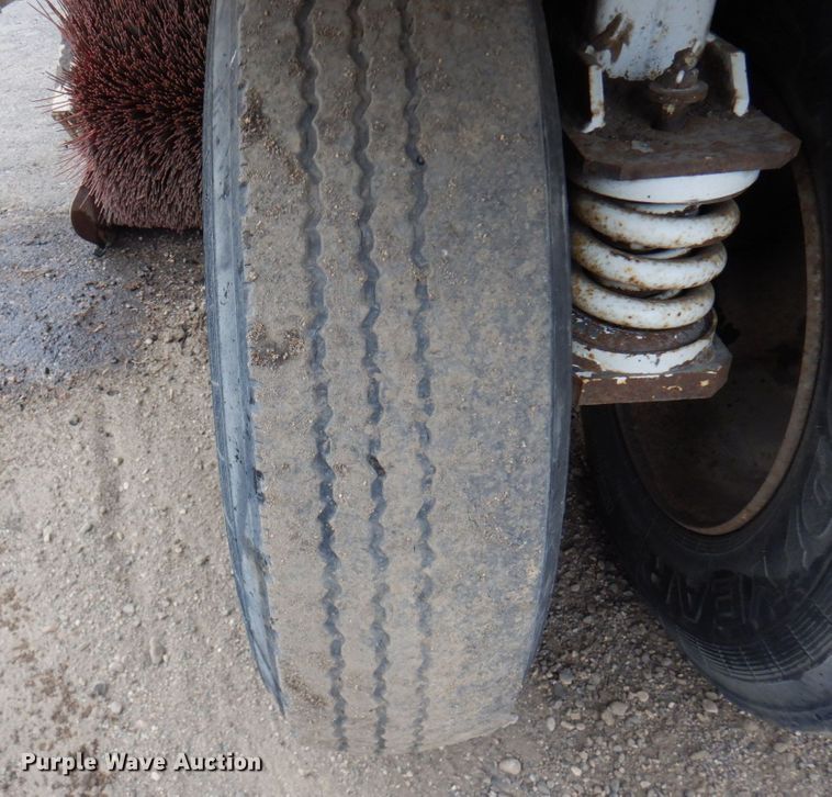 image for item DQ7240 1999 Elgin Pellican Series P  street sweeper truck