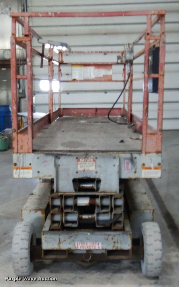 image for item DR0518 1999 Mec 2548HT  scissor lift