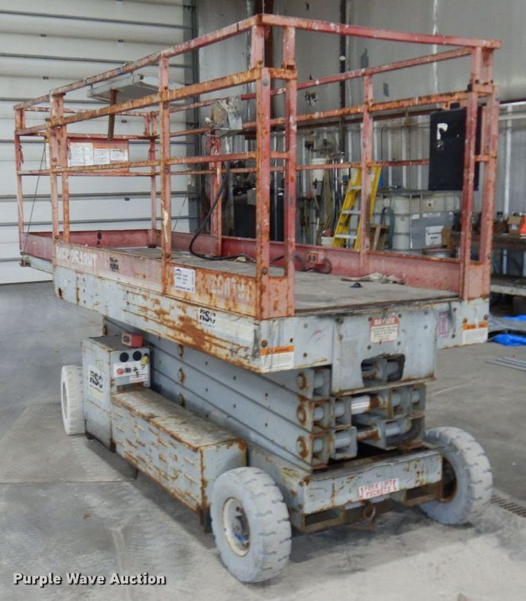 image for item DR0518 1999 Mec 2548HT  scissor lift