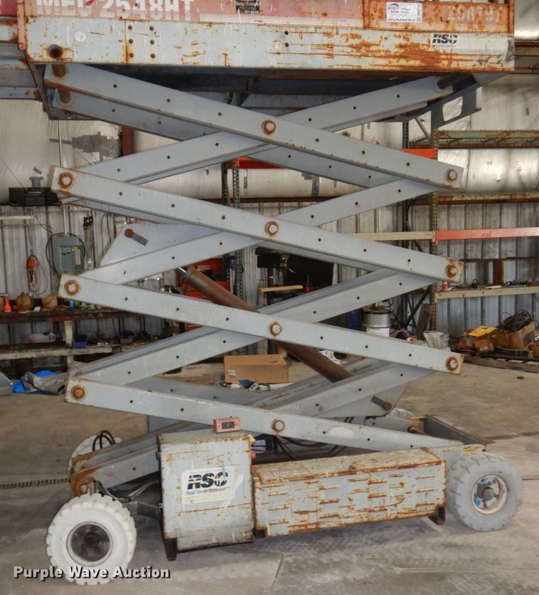image for item DR0518 1999 Mec 2548HT  scissor lift
