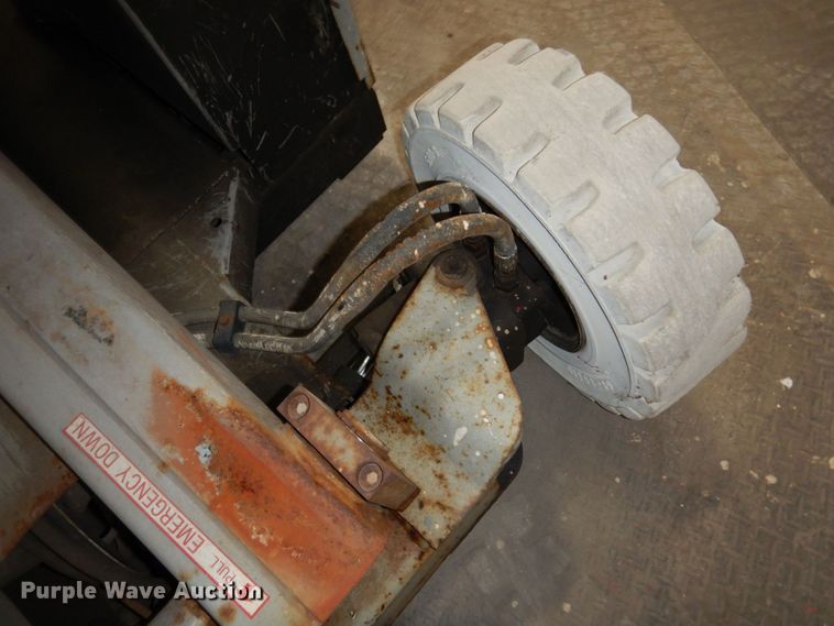 image for item DR0518 1999 Mec 2548HT  scissor lift