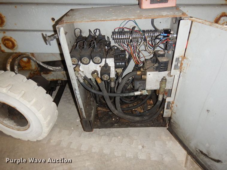 image for item DR0518 1999 Mec 2548HT  scissor lift