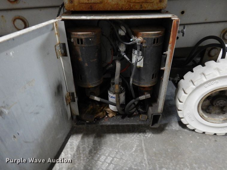 image for item DR0518 1999 Mec 2548HT  scissor lift