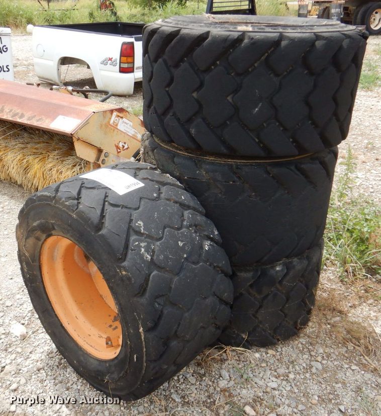image for item DR1994 (4) Galaxy skid steer tires and wheels