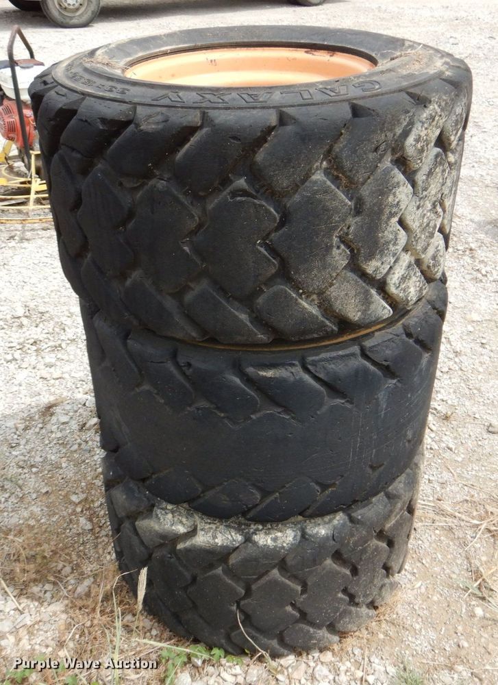 image for item DR1994 (4) Galaxy skid steer tires and wheels