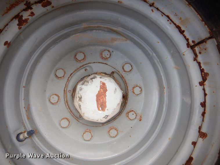 image for item DS8196 (2) American Farmer 16.5L-16.SL tires and wheels