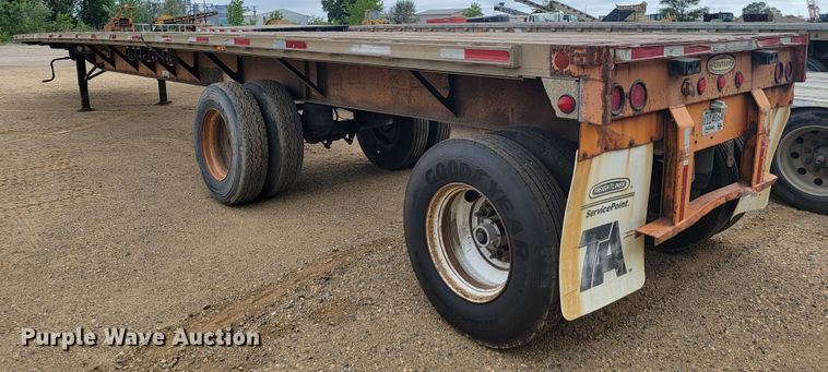 image for item JC9666 1999 Fontaine LFTW-6-8048WSAK  flatbed trailer