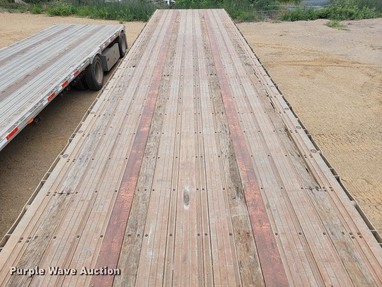 image for item JC9666 1999 Fontaine LFTW-6-8048WSAK  flatbed trailer