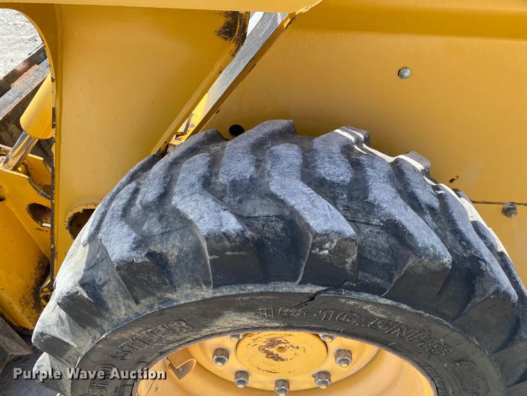 image for item JW9455 2006 John Deere 320  skid steer loader