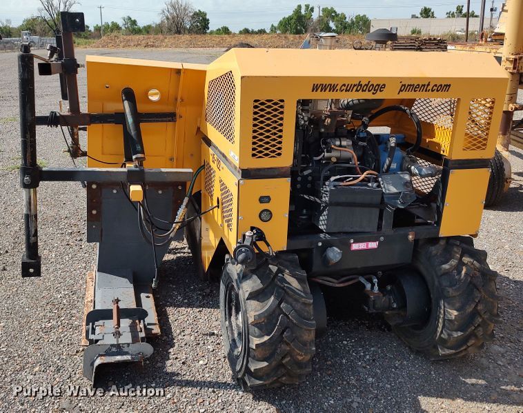 image for item JX9242 Curb Dog CD3300  curb machine