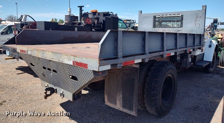 image for item JX9255 1996 Ford F700  dump flatbed truck