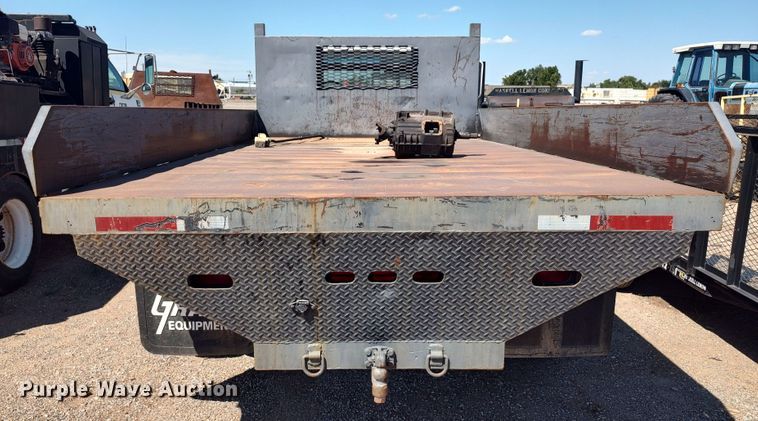 image for item JX9255 1996 Ford F700  dump flatbed truck