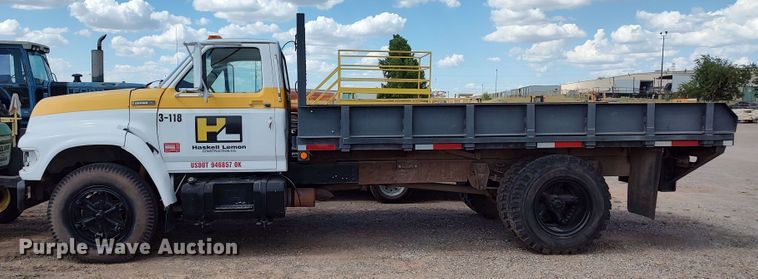 image for item JX9255 1996 Ford F700  dump flatbed truck
