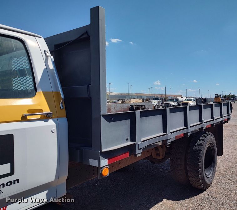 image for item JX9255 1996 Ford F700  dump flatbed truck